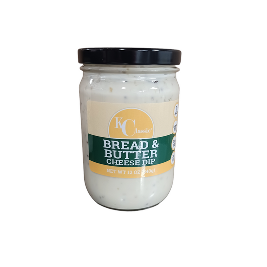 KC Classic Gourmet Bread & Butter Jalapeno Cheese Dip in a glass jar with a black lid and green-and-yellow label.