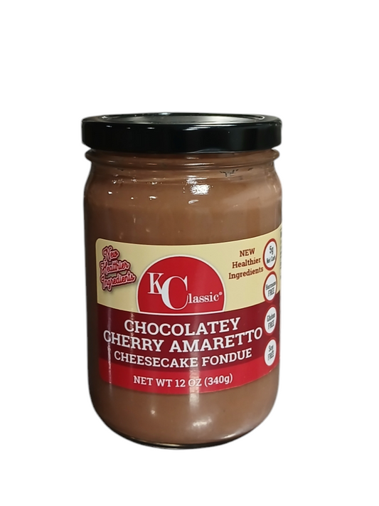 KC Classic Gourmet Chocolatey Cherry Amaretto Cheesecake Fondue in a glass jar with a black lid and red label.