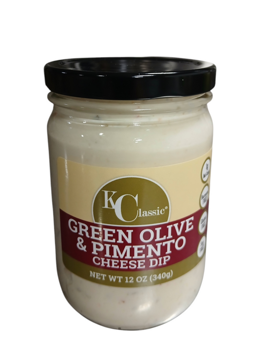 KC Classic Gourmet Green Olive & Pimento Cheese Dip in a glass jar with a black lid and burgundy-and-gold label.