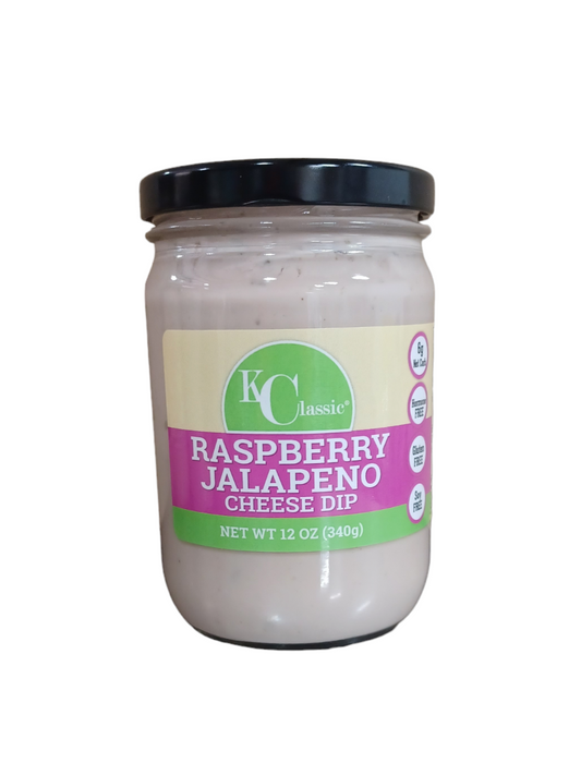 KC Classic Gourmet Raspberry Jalapeno Cream Cheese Dip in a glass jar with a black lid and pink-and-green label.